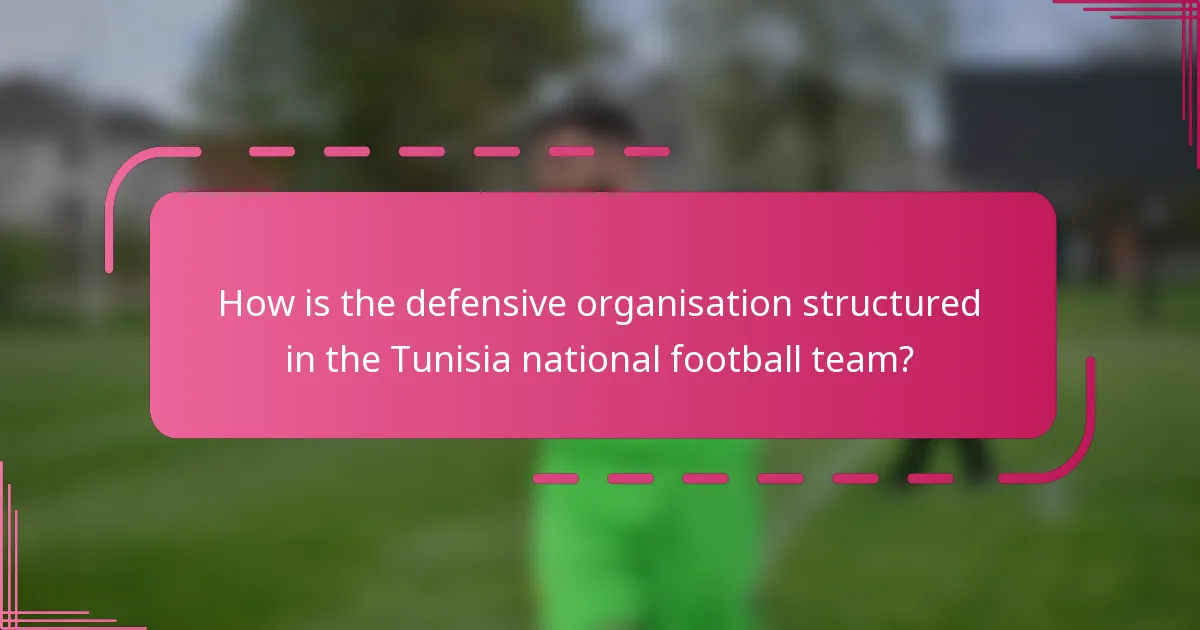 How is the defensive organisation structured in the Tunisia national football team?